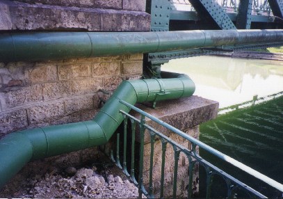 Vacuum Sewer attached to the bridge abutment, Chappes, France