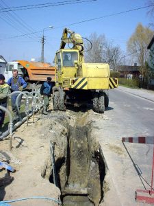 Installation underway in narrow trenches. Cost-effective solutions to many difficult drainage problems