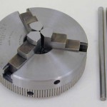 Three-jaw chucks are convenient for holding round work quickly. Shown above is the 2.5" diameter chuck P/N 1041. The 3-jaw chuck is also available in 3.1" diameter.