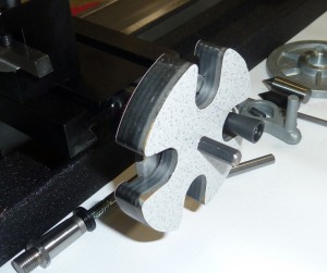 The adapter is shown pressed into position on a 4400 lathe crosslide handwheel. It really comes in handy on the longer axis but will work on any Sherline lathe or mill adjustable zero handwheel.